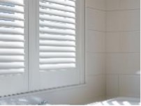 Blinds design guide - shutters in a white bathroom